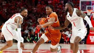 Texas guard Max Abmas moves the ball during a Big 12 men's basketball game between the Houston Cougars and the Texas Longhorns