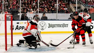 New Jersey Devils left wing Jesper Bratt shoots against Philadelphia Flyers goaltender