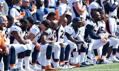 NFL Players' Protest Explained: Why Are NFL Players Kneeling?